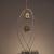 22"abstract hanging with aluminum, drilled stones and four tealight jars.
