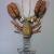 First Lobster
Cork, pottery shards, drilled stone, hammered copper and wire.
18" 2013